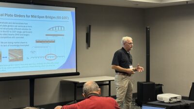 Michael Barker shares progress on the professional education and university lecture series.