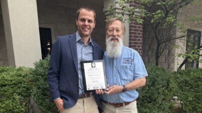 Dr. Matthew Reichenbach, shown here with Dr. Todd Helwig, is the 14th recipient of the Robert J. Dexter Memorial Award Lecture.