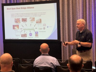 Dr. Michael Barker presents on practical steel bridge design solutions, highlighting the SSSBA’s goal of making steel bridges easier to design, faster to deliver, and more economical for local communities.