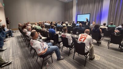 NACE 2026 Dr. Michael Barker, SSSBA Director of Education and Professor at the University of Wyoming, presented practical approaches to simplifying short span steel bridge design.Presenting - RED CROP